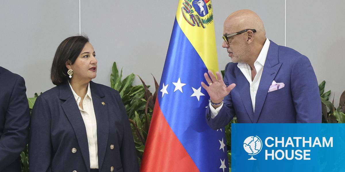 Jorge Rodríguez, right, speaks with Dinorah Figuera, former opposition deputy on 6 August 2026 in Caracas, Venezuela.