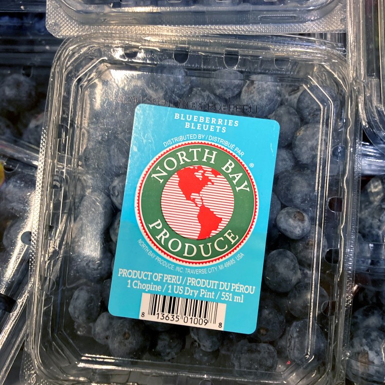 A grid of six blueberry packages with different labels.