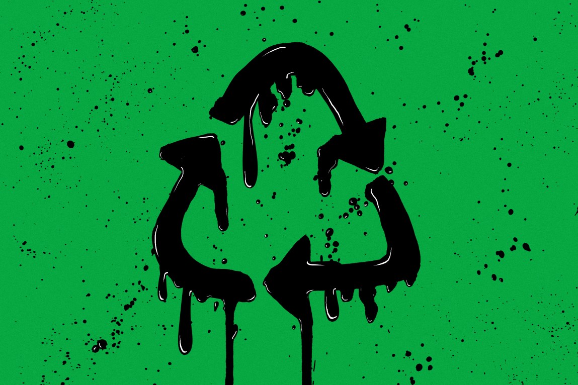 A chasing arrows recycling symbol made of dripping crude oil.