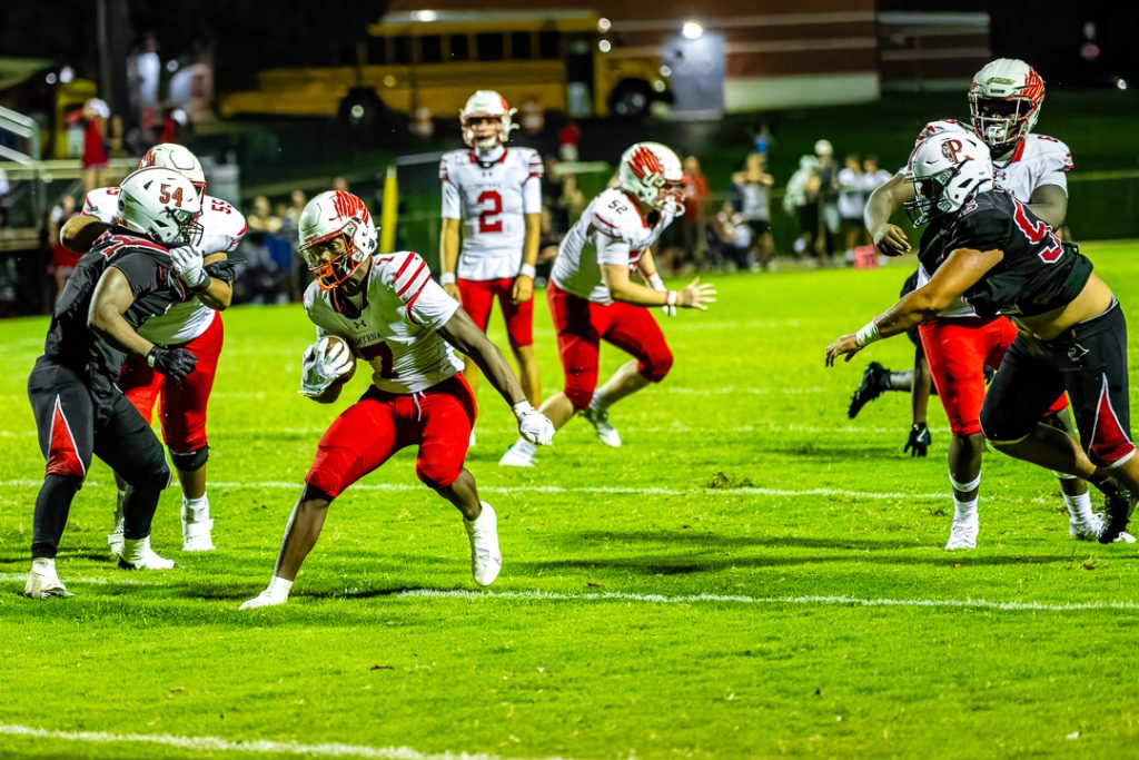Smyrna sophomore, Terrell Ingram, runs the ball against Red Lion in the Eagles first game of the season. Photo credit: Dave Reeder