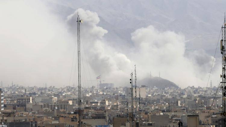 Smoke rises over the city after an Israeli army launches 2nd wave of airstrikes on Iran on February 28, 2026.