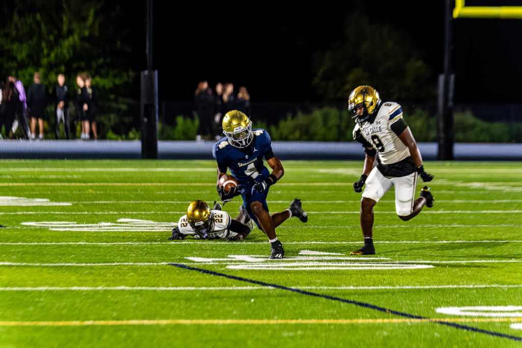 Jones breaks a tackle following one of his five catches of the game. Jones finished the game with 126 receiving yards.