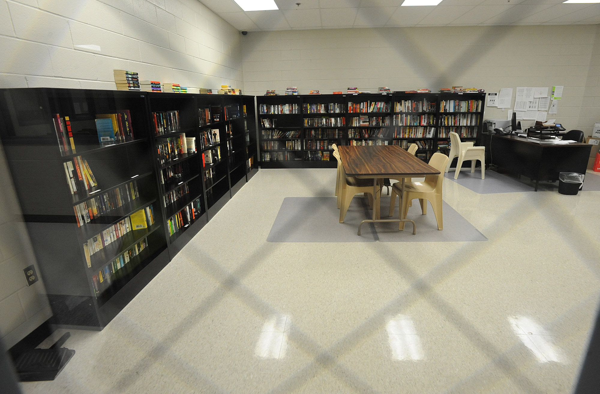 The library is seen through a window during a tour to reveal the recent completion of Phase I of the Rensselaer County Jail in Troy, N.Y. Wednesday, Oct. 19, 2011. Photo by Lori Van Buren/Albany Times Union via Getty Images)