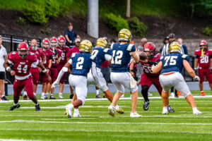 Sallies quarterback Brady Nabb receives the snap in Salesianum football's scrimmage against St. Joseph's Prep.