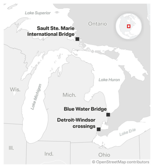 A regional map highlights key international border crossings between Michigan and Ontario, including the Sault Ste. Marie International Bridge, the Blue Water Bridge and Detroit-Windsor crossings. Surrounding Great Lakes — Lake Superior, Lake Michigan, Lake Huron and Lake Erie — are labeled alongside neighboring U.S. states.