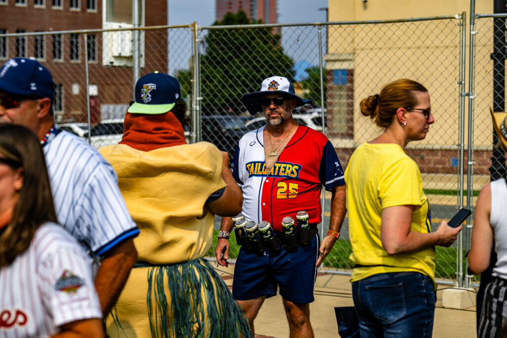 Husni meets Tailgater assistant coach Andrew Bartman pregame. 