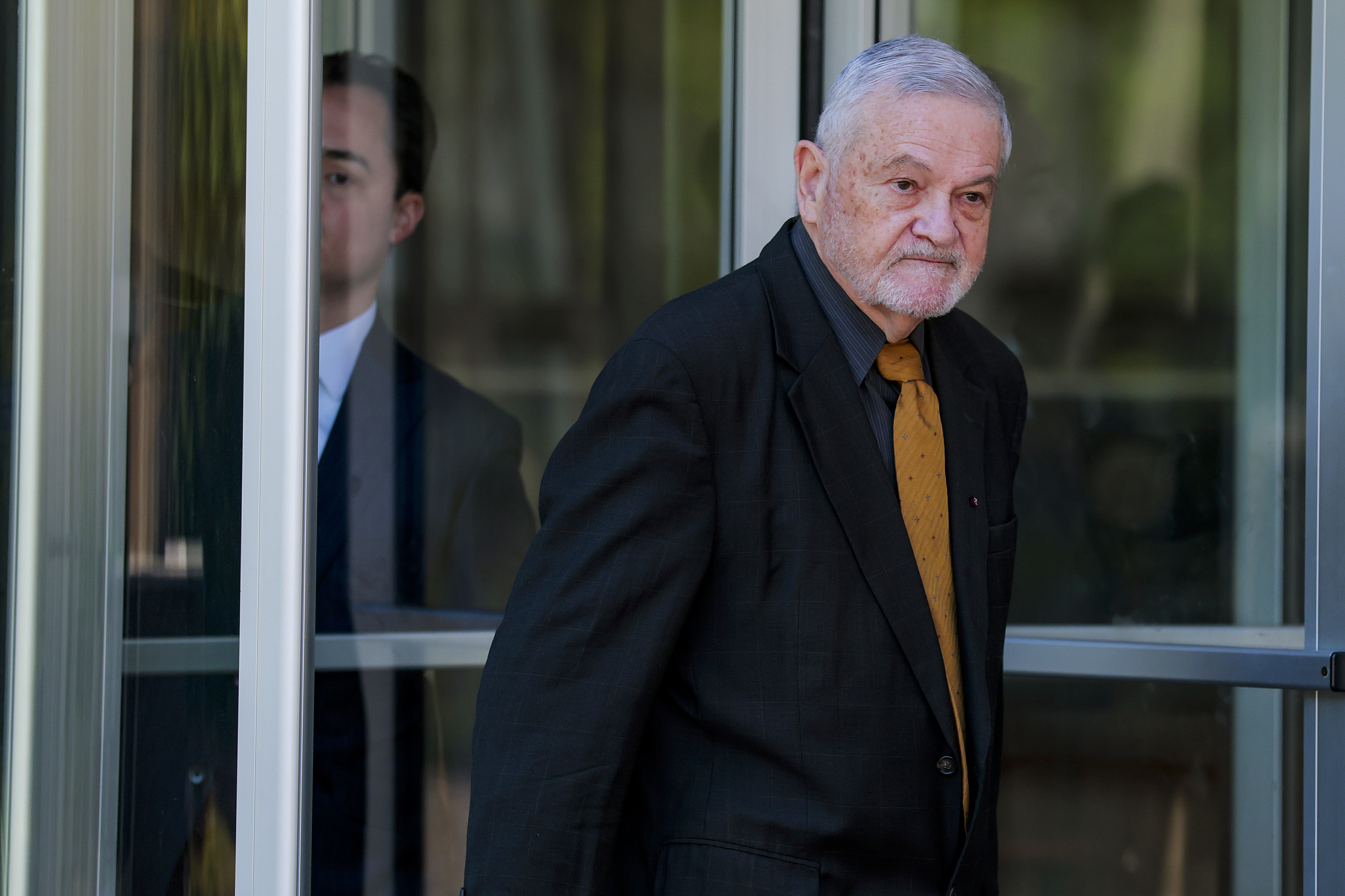 GREENBELT, MARYLAND - MAY 08: David Morens leaves the U.S. District Court following his arraignment on felony charges alleging he concealed communications related to virus research from Freedom of Information Act requests May 08, 2026 in Greenbelt, Maryland. Prosecutors allege Morens used a private Gmail account to conduct official business related to COVID-19 research and the origins of the pandemic. (Photo by Heather Diehl/Getty Images)