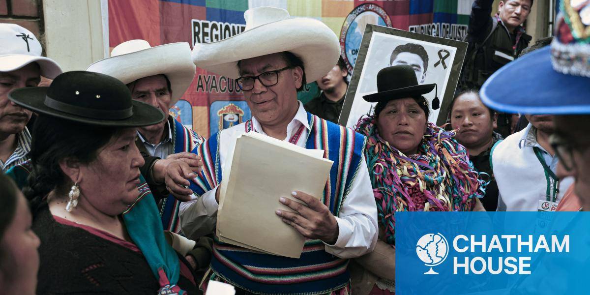 Presidential candidate Roberto Sanchez, wearing a white sombrero, surrounded by supporters
