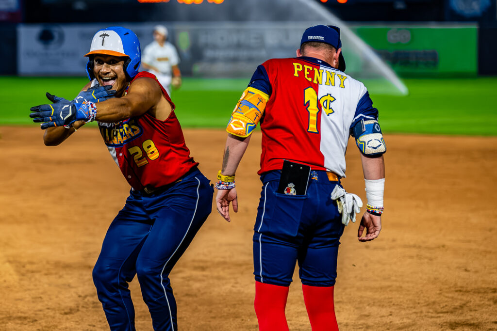 Tailgater Jose Gonzalez (No. 28) celebrates after getting a hit. The Tailgaters ended up winning the game, 6-3.