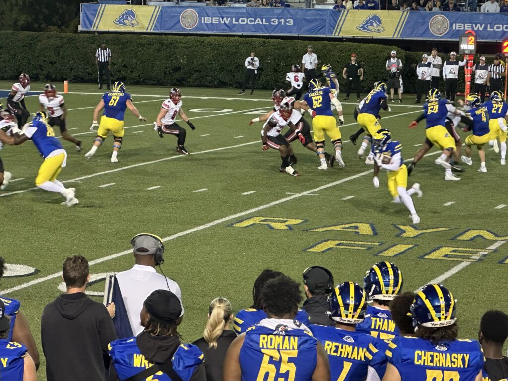 Photo Credit: George Rotsch. UD runs the ball against Western Kentucky University in first home CUSA game in program history. Photo Credit: George Rotsch.