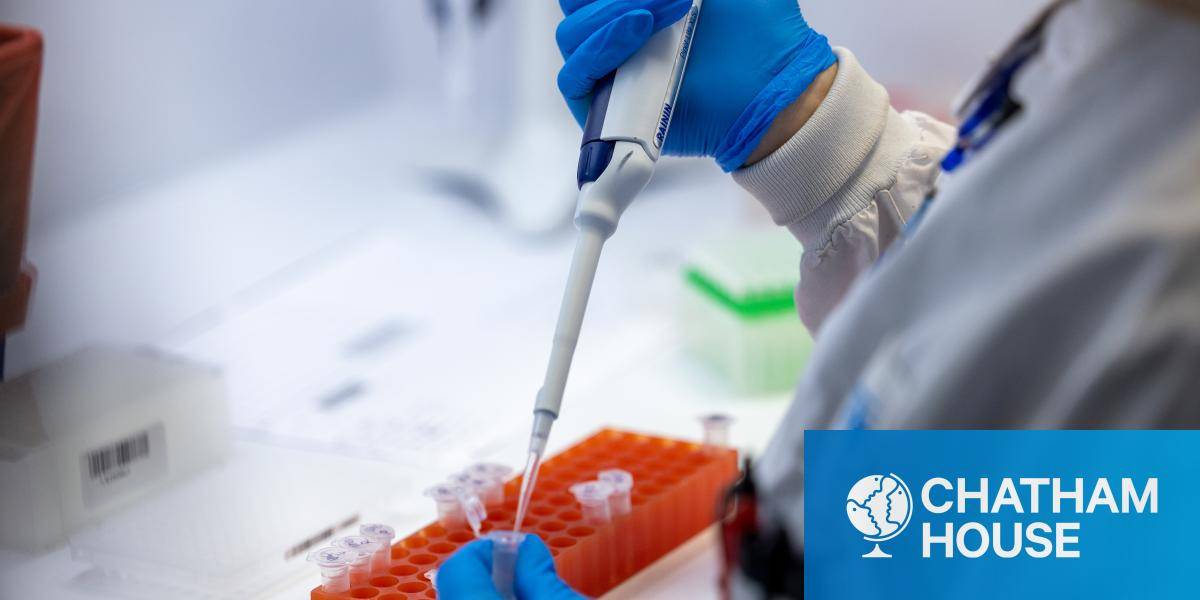 A microbiologist processes Covid-19 and Monkeypox tests