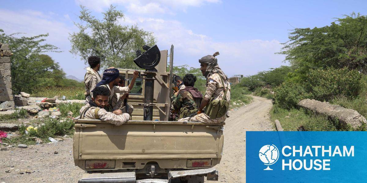 Yemeni soldiers ride in a truck near Taiz