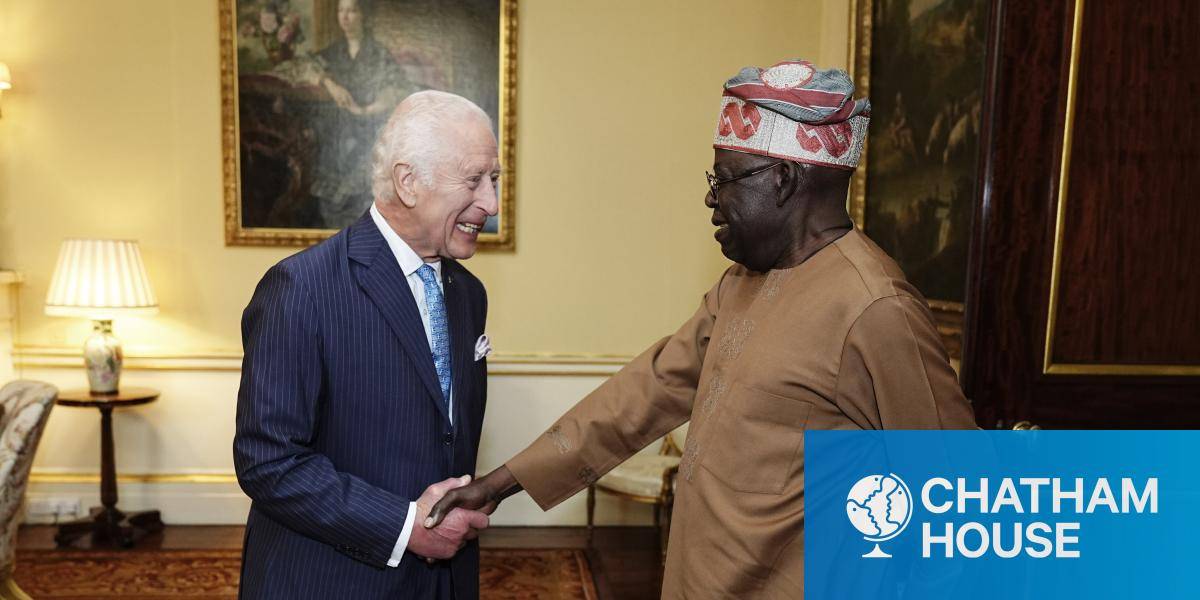 King Charles III greets Nigerian President Bola Ahmed Tinubu