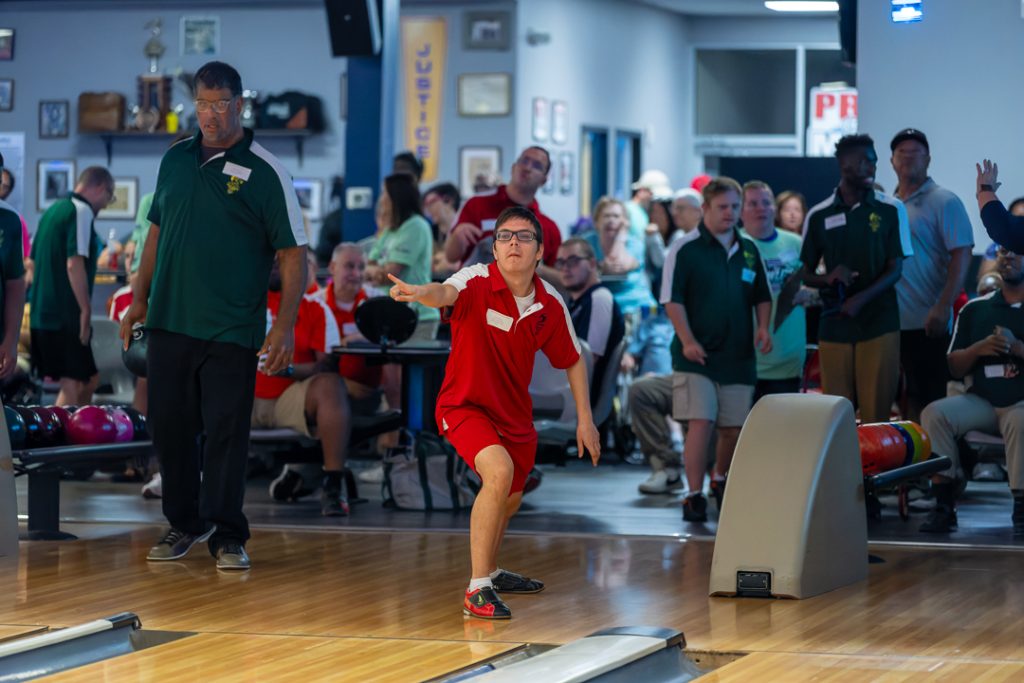 A member of the Sussex Riptides watches as his bowling ball tumbles down the lane.