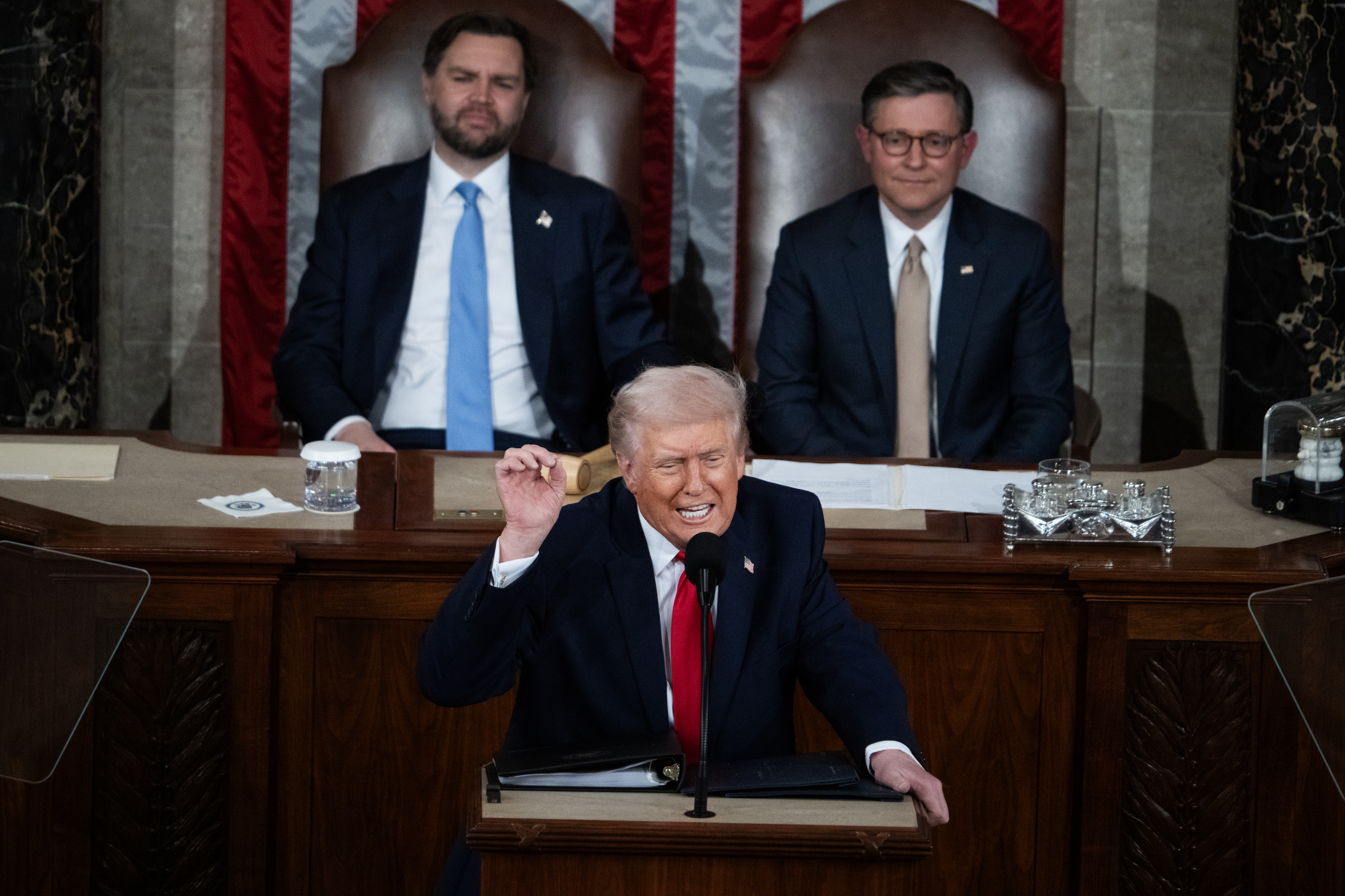 UNITED STATES - FEBRUARY 24: President Donald Trump delivers his State of the Union address in the House Chamber of the U.S. Capitol on Tuesday, February 24, 2026. Vice President JD Vance, left, and Speaker of the House Mike Johnson, R-La., also appear. (Tom Williams/CQ-Roll Call, Inc via Getty Images)