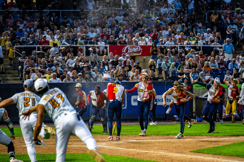 Both teams broke out into an impromptu water balloon fight during Nick Lopez's (Tailgaters' No. 9) at-bat. Lopez was not allowed to step out of the box because a rule of Banana Ball requires the hitter to stay in the box no matter what. If the batter steps out of the box the batter is out. 