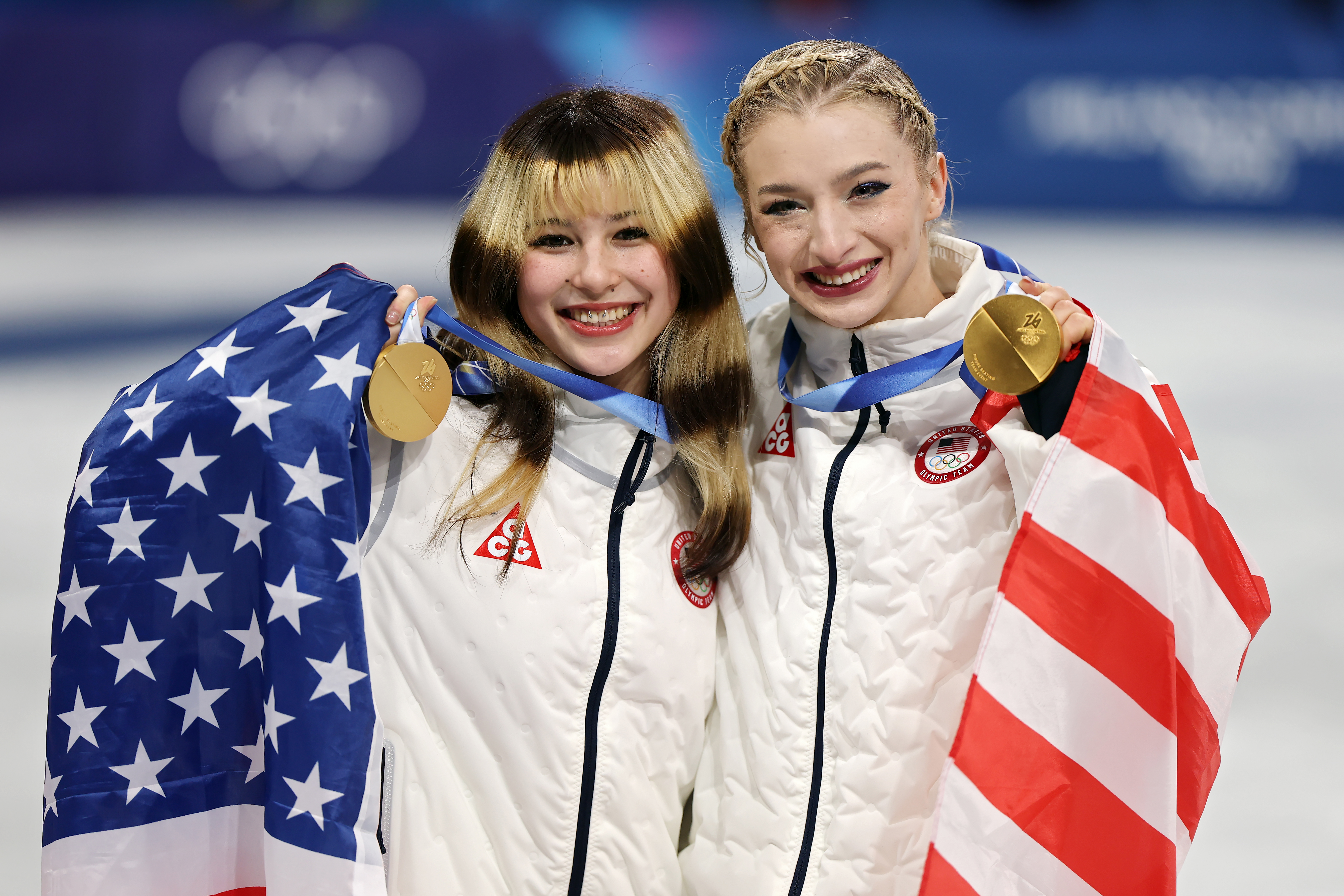 MILAN, ITALY - FEBRUARY 08: Gold medalist Alyssa Liu and Amber Glenn of Team United States pose for a photo after the Medal Ceremony for the Team Event after the Men's Single Skating - Free Skating Team Event on day two of the Milano Cortina 2026 Winter Olympic games at Milano Ice Skating Arena on February 08, 2026 in Milan, Italy. (Photo by Jamie Squire/Getty Images)
