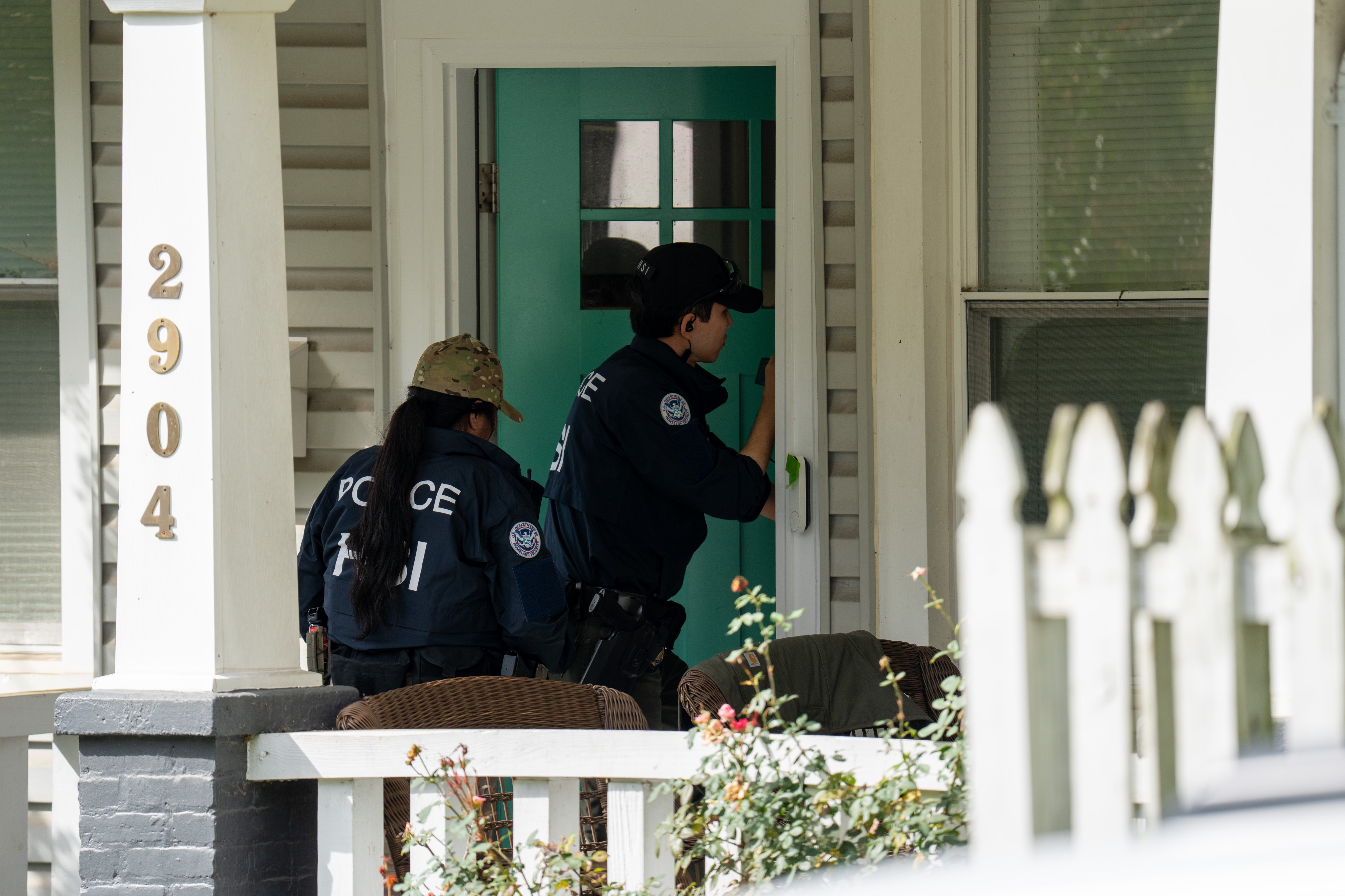 WASHINGTON, DC - OCTOBER 12: Homeland Security Investigations police search the home of Rep. Ilhan Omar (D-MN) on October 12, 2026 in Washington, DC. According to reports, the search is part of an ongoing criminal investigation. (Photo by Andrew Leyden/Getty Images)