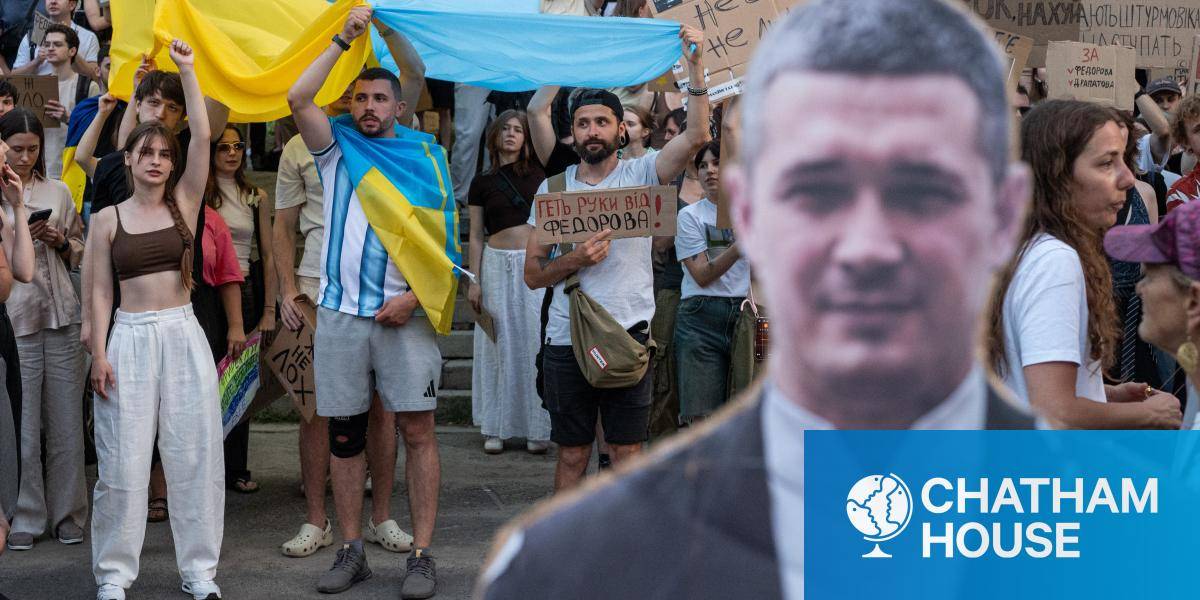 People attend a rally to protest the dismissal of defense minister of Ukraine Mykhailo Fedorov.