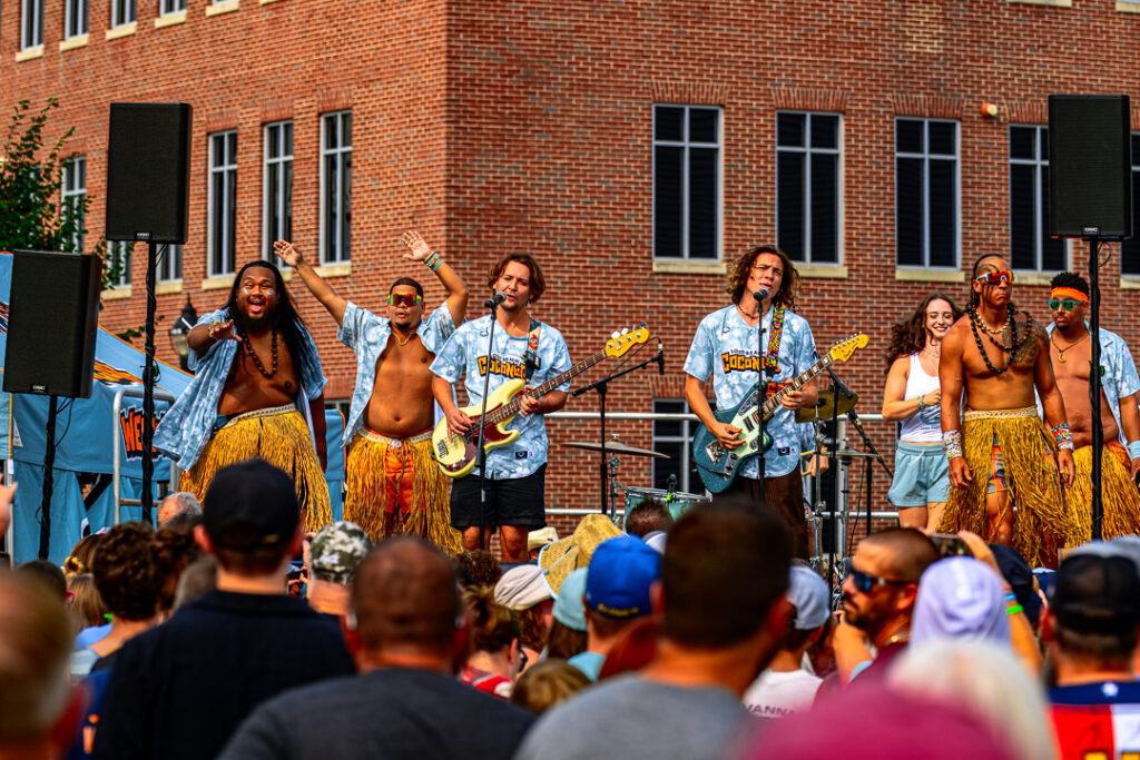 Sitting on Saturn performs during the pregame Loco Beach Live Show. Photo Credit: Dave Reeder