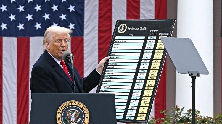 US President Donald Trump delivers remarks on reciprocal tariffs during an event in the Rose Garden at the White House.