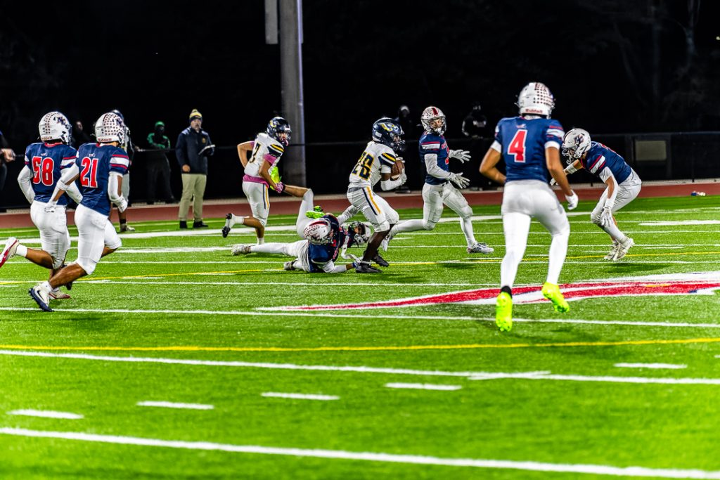Blue Jay senior Leshaun Allen navigates through the Patriot defense for a gain of 33-yards on a pass from Burton. 