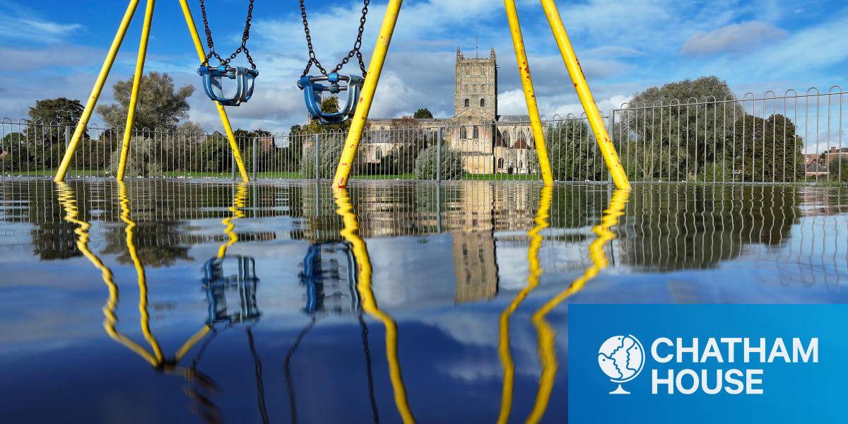 Tewkesbury Abbey and a children's playground are surrounded by flood waters after Storm Babet 