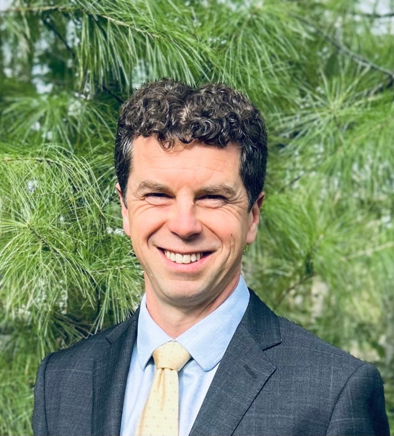 Jameson Tweedie is seen in a portrait headshot.
