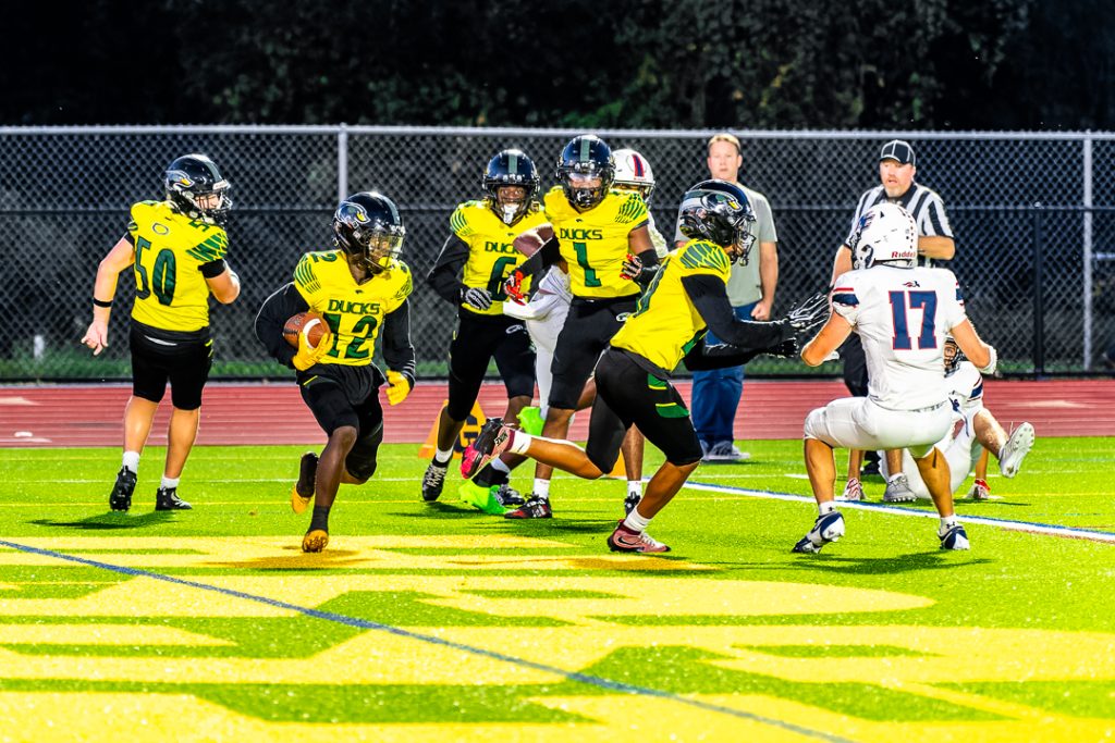 Odessa senior Thomas Ngateh looks for running room after intercepting the pass.