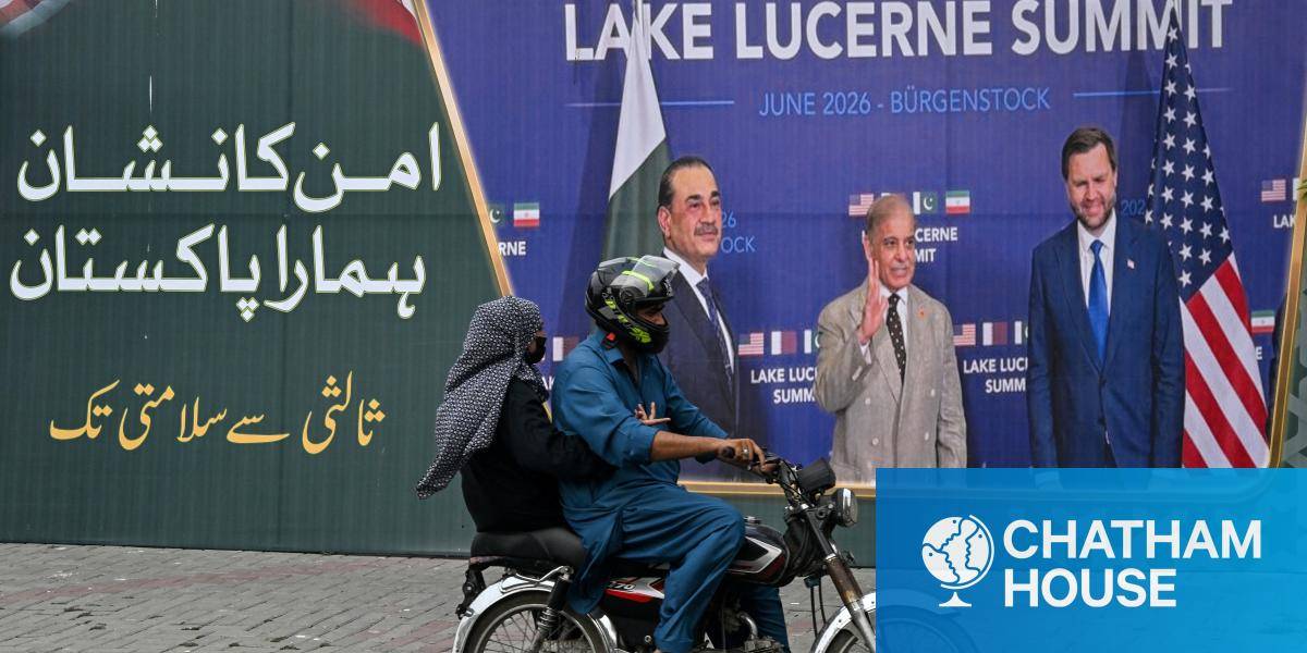 A family rides past a billboard featuring Pakistan's Prime Minister Shehbaz Sharif, Pakistan's Chief of Army Staff Field Marshal Asim Munir and the US Vice President JD Vance. 