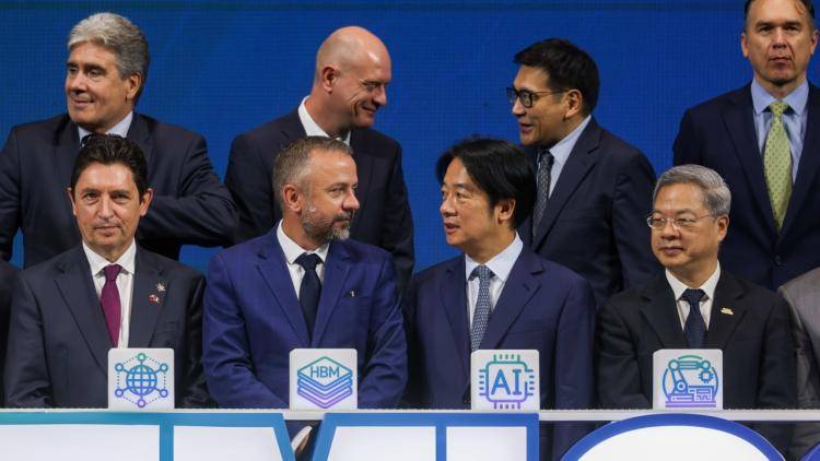 Taiwanese President Lai Ching-te (front centre right) speaks to Marek Zenisek, Czech Minister for Science, accompanied by other diplomats and industrial leaders at the Semicon Network Summit, in Taipei, Taiwan