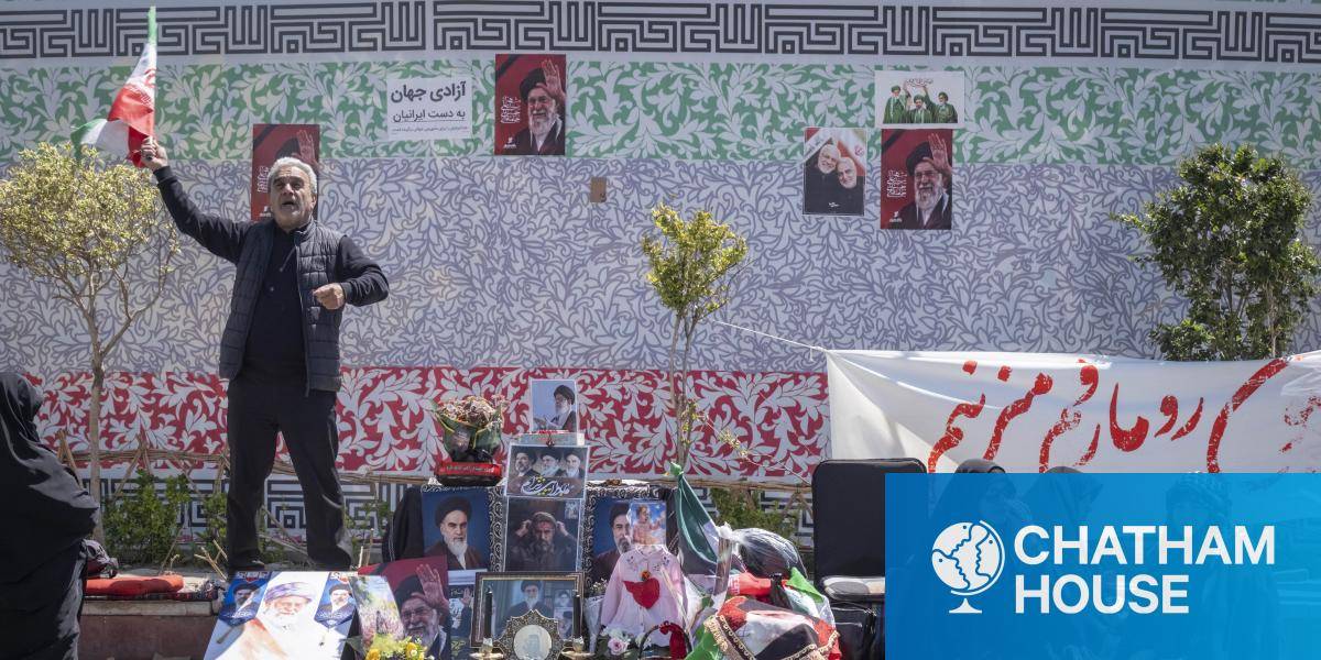 Pro-government demonstrators gather next to portraits of Iran's late Supreme Leader Ayatollah Ali Khamenei in downtown Tehran, Iran, on 8 April 2026. 