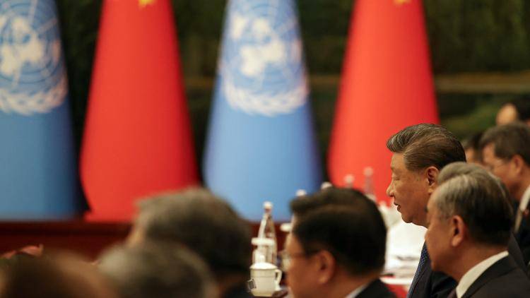 China's President Xi Jinping speaks during a bilateral meeting with UN Secretary General Antonio Guterres.