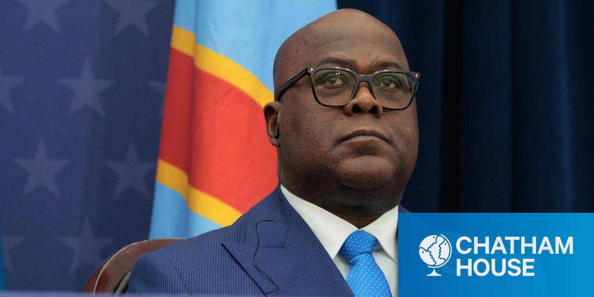 President Felix Tshisekedi, a DRC flag behind him, at a White House ceremony