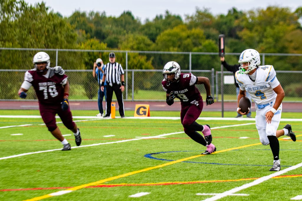 Tingle runs the ball after getting into the redzone and scores on a three-yard run. Tingle's score gave Cape Henlopen a seven-point lead.