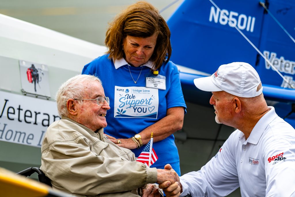 US Air Force Lieutenant Colonel Sheldon Slater (age 95) was the first veteran to take flight. Here he shakes the hand of Founder and President of Dream Flights, Darryl Fisher, before the two go up in the air.