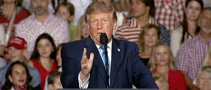 President Donald Trump speaks at a rally before a crowd