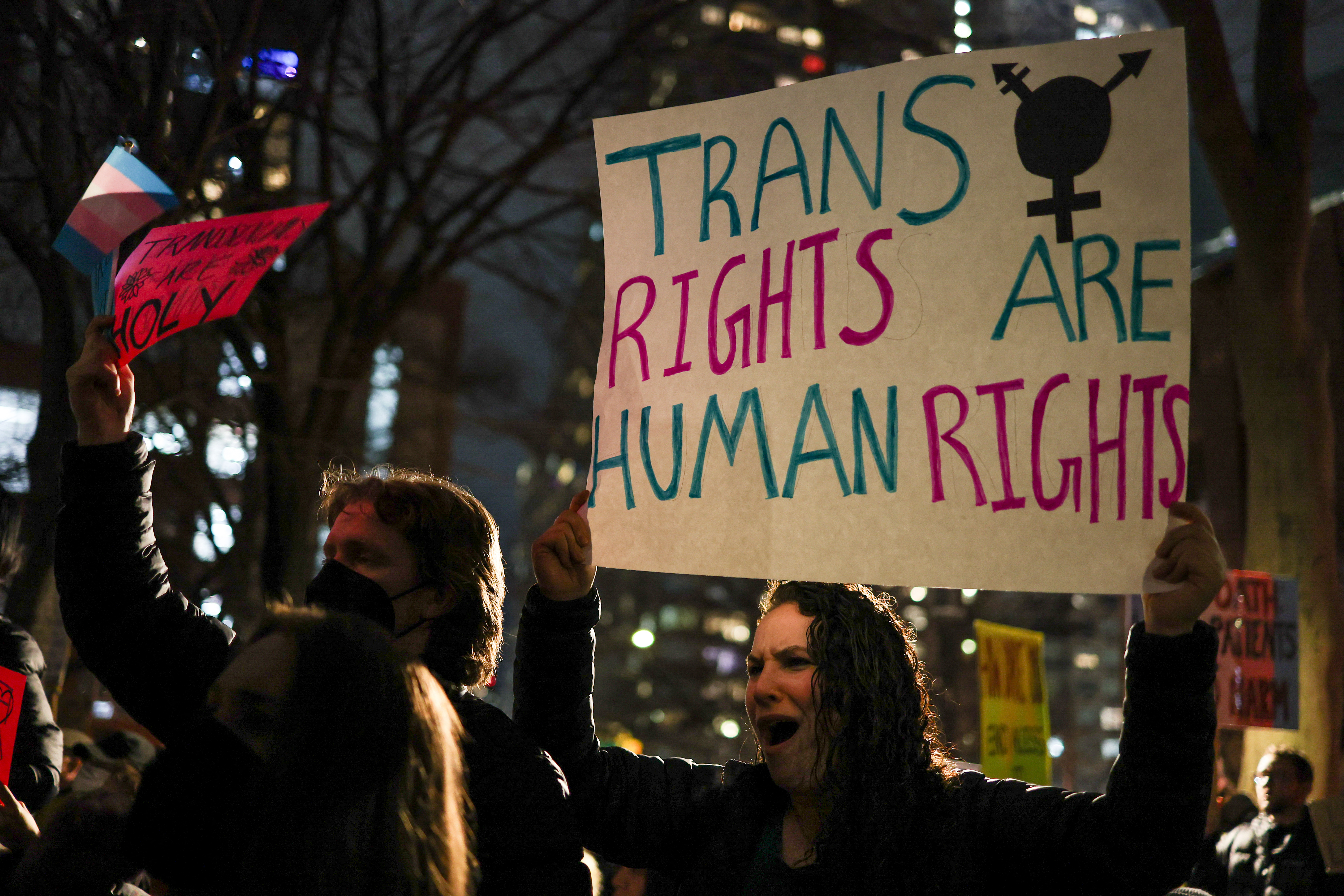 People gather to defend trans people rights in New York City on February 3, 2025. Hundreds of people protested in New York February 3 against US President Donald Trump's executive order signed January 28, 2025, to restrict gender transition procedures for people under the age of 19, and reports of a local hospital group cancelling appointments for young people in response. (Photo by CHARLY TRIBALLEAU / AFP) (Photo by CHARLY TRIBALLEAU/AFP via Getty Images)