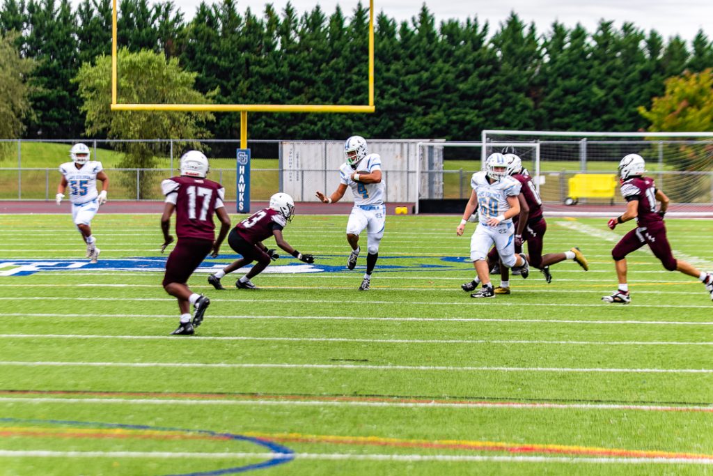 Cape Henlopen quarterback Jameson Tingle runs down the field during the Vikings' second drive of the second half.