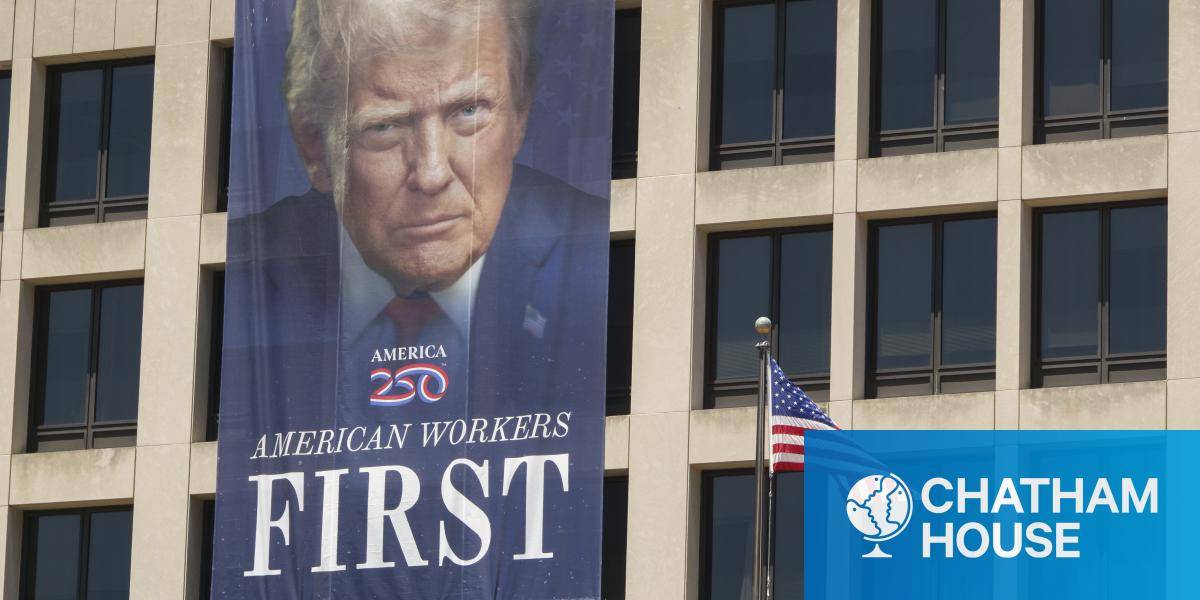 A banner with a portrait of US president Donald Trump on the US Department of Labor Frances Perkins Building