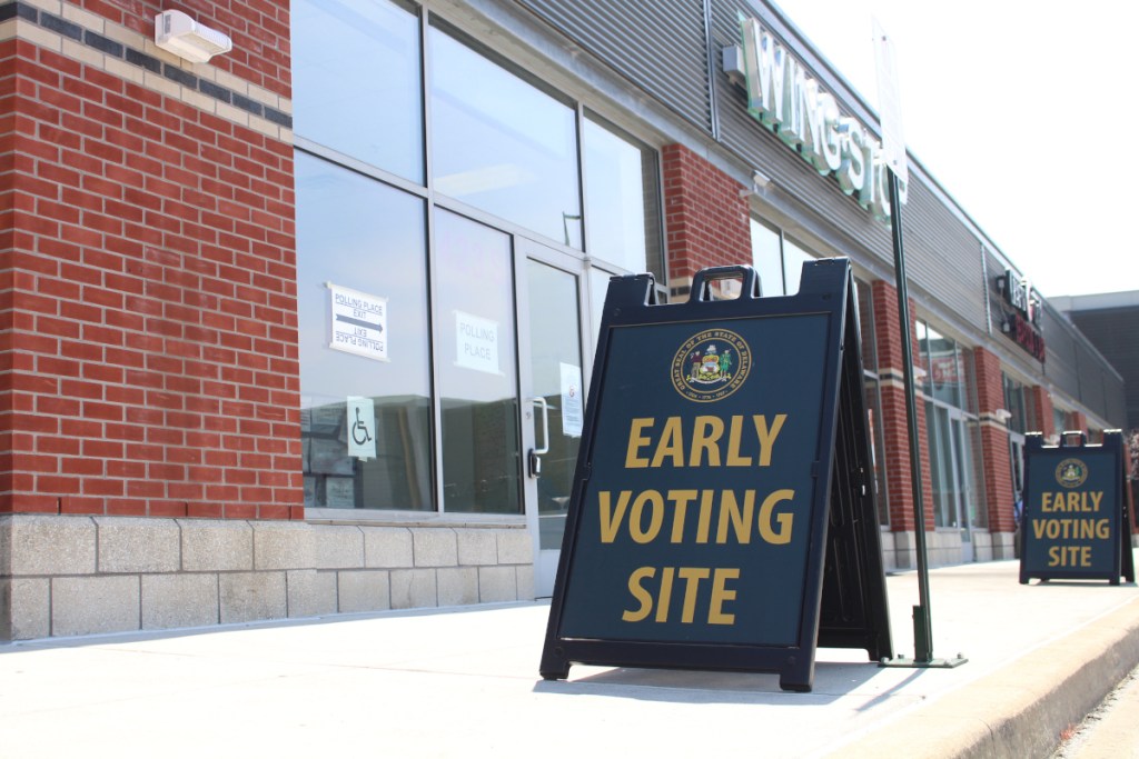 Voters walk into an early voting center in the Christina Crossing shopping center in Wilmington, Delaware, on Aug. 29, 2024.