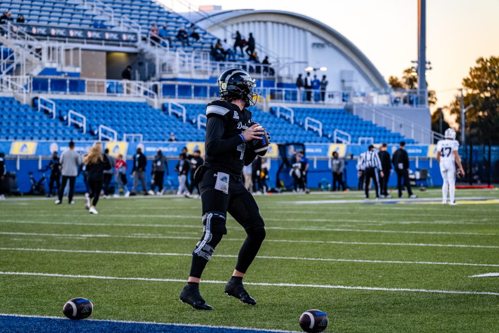 Fightin' Blue Hen quarterback, Nick Minicucci, warming up before UD's game against Missouri State on October 20. Photo Credit: Dave Reeder