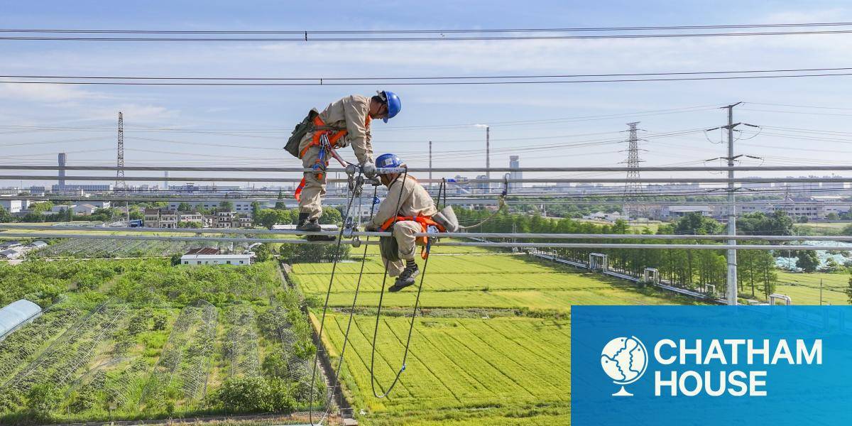 Workers on an electricity line in Jiangsu, China