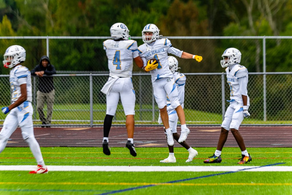 Cape Henlopen seniors Jameson Tingle and Aidan Lehmuth celebrate after connecting on a 26-yard passing touchdown. The score cut the Silver Eagle lead to two with three minutes remaining before halftime.