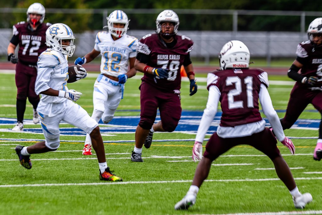 Viking senior Geordan Downing looks for more running room during his 22-yard reception in the second quarter.