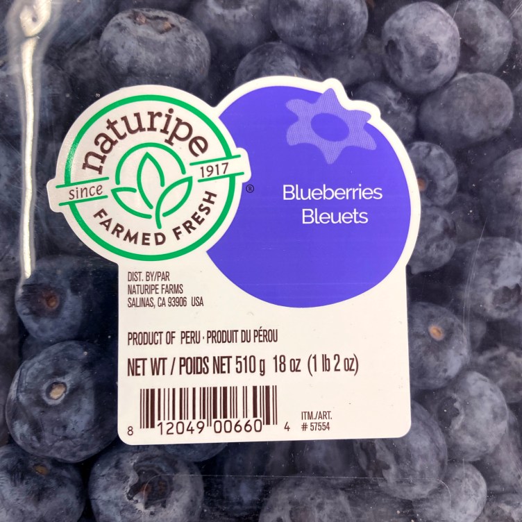A grid of six blueberry packages with different labels.