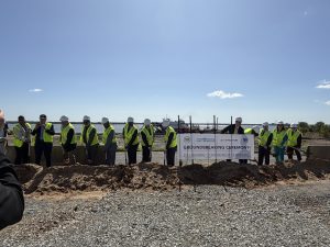 Members of the DSPC, state legislature and Enstructure pose for a photo at the groundbreaking ceremony for the Delaware Container Terminal. Photo Credit: Ryan Colasanti