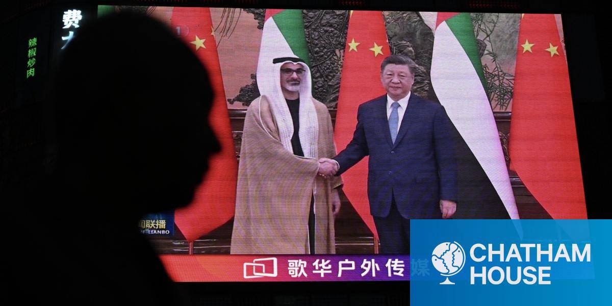 A giant screen outside a shopping mall shows Abu Dhabi's Crown Prince Sheikh Khaled bin Mohamed bin Zayed Al Nahyan&nbsp;meeting President Xi Jinping in Beijing on 14 April 2026.