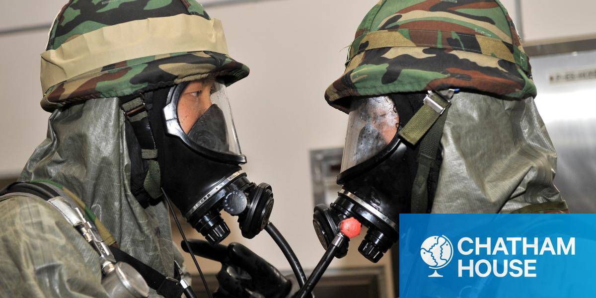 Biochemical warfare soldiers during an anti-terror drill. Photo by JUNG YEON-JE/AFP via Getty Images.