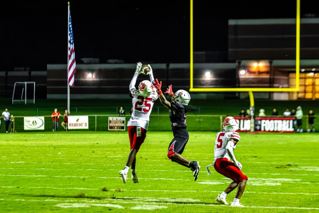 Sophomore defensive back, Amari Ashley, intercepts a Red Lion pass in the first half. Photo Credit: Dave Reeder